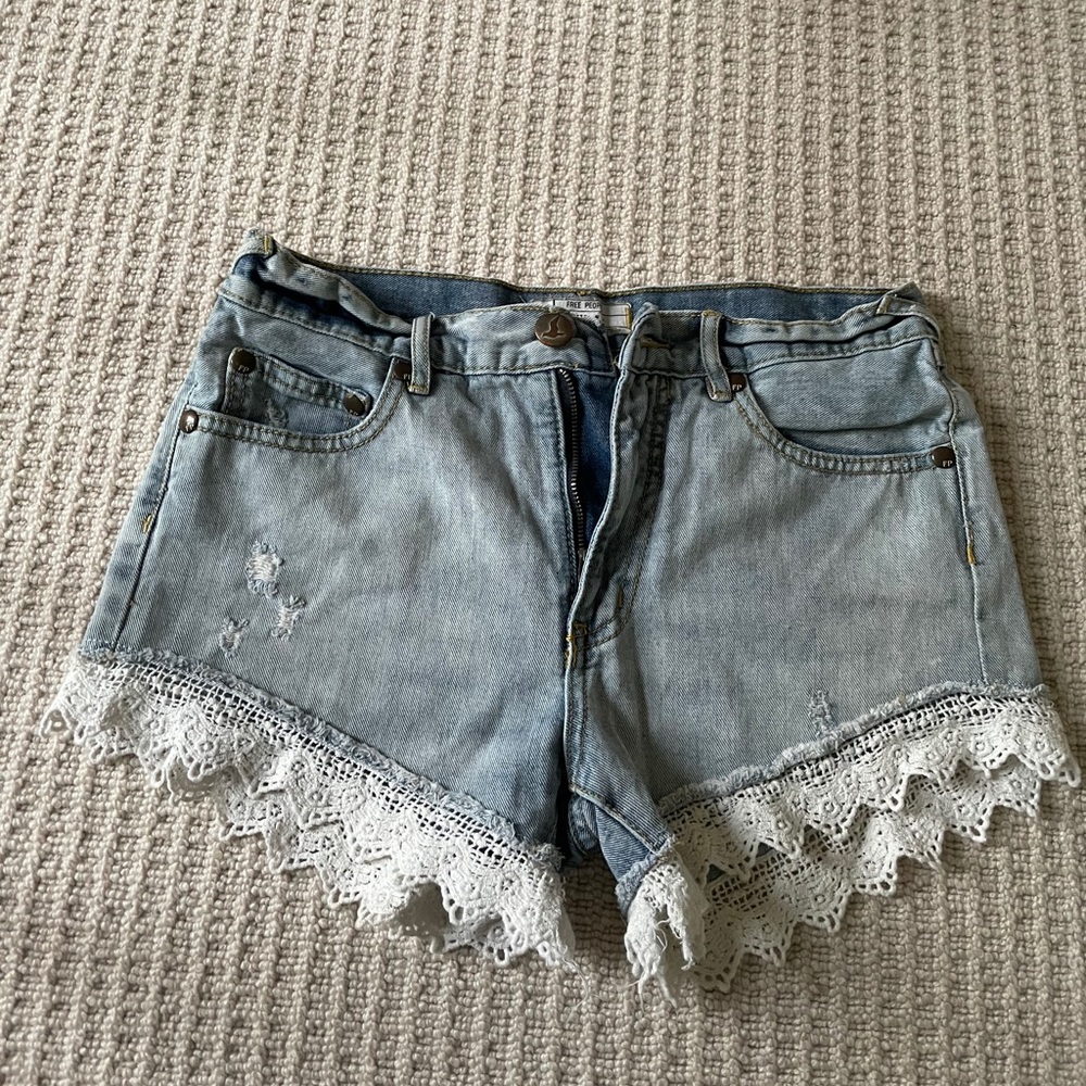 FreePeople denim shorts with white eyelet hem